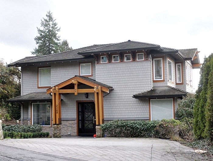  A deal to sell this house on Kings Avenue in West Vancouver resulted in a complaint that has resulted in a one-year suspension of real estate agent Shahin Behroyan by the Real Estate Council of B.C. The suspension is on hold pending an appeal. photo Kevin Hill, North Shore News