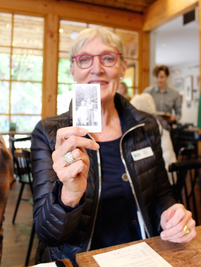  Nancy Stibbard holds a photo of herself and her dad being used as a label on beer flights (Lindsay William-Ross/Vancouver Is Awesome)