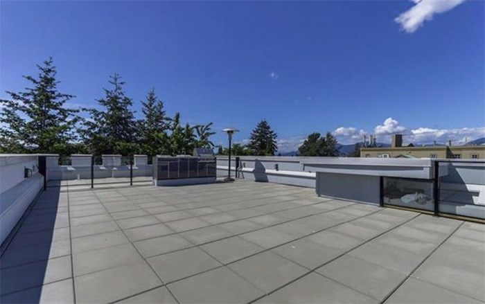  The roof terrace of this East Vancouver has an outdoor kitchen, wet bar and 360-degree views. Listing agent: David Caron