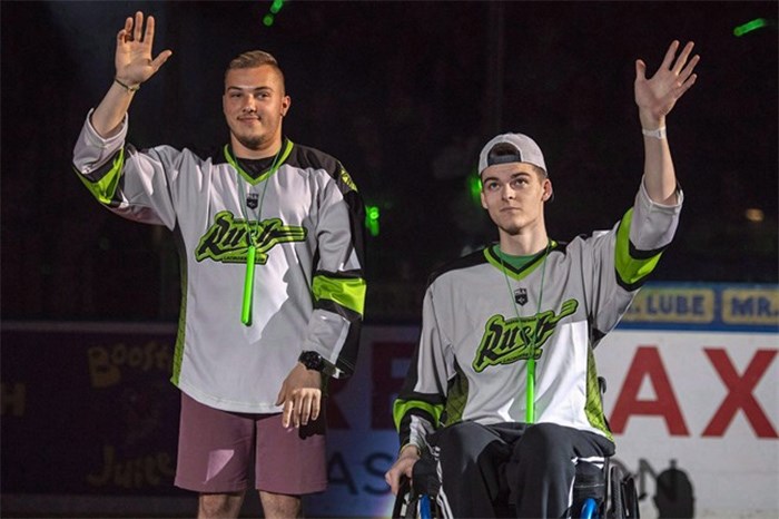  Humboldt Broncos bus crash survivors Kaleb Dahlgren, left, and Jacob Wasserman are introduced as the heroes of the game prior to the Saskatchewan Rush taking on the Rochester Knighthawks in game three of the the National Lacrosse League finals in Saskatoon on June 9, 2018. Ten of the 13 survivors from the Humboldt Broncos bus crash are in Las Vegas this week to attend the NHL awards. Some of the players who boarded flights in Saskatoon Monday said it will be emotional, but great to see their former teammates. THE CANADIAN PRESS/Liam Richards