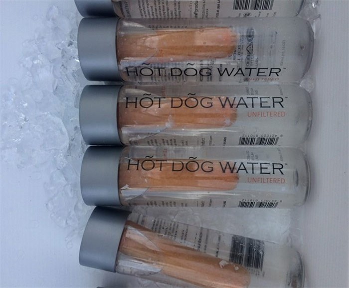  Bottles of Hot Dog Water being sold at an event in Vancouver last week are shown in a handout photo. Douglas Bevans put boiled hot dog water in bottles containing a hot dog and advertised it as providing health benefits, backed up by supposed science. THE CANADIAN PRESS/HO-Douglas Bevans 