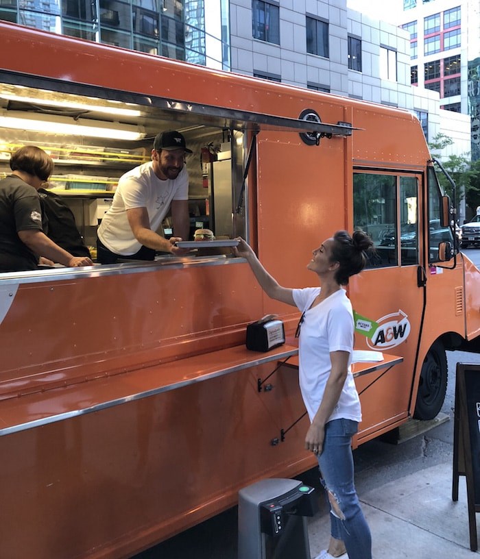  Vancouver's Ireland checks out the Beyond Meat burger at an A&W event in Toronto on June 21, 2018 (Photo courtesy Erin Ireland)
