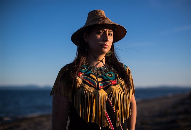  Mique'l Dangeli, of the Tsimshian First Nation, poses for a photograph in Tsawwassen, B.C., on Saturday June 23, 2018. A First Nations woman working to revive a threatened language in her traditional territory of northern British Columbia says she's being forced to leave the country on Canada Day. Dangeli belongs to the Tsimshian First Nation, whose territory straddles the border between Alaska and British Columbia. She says Canada won't recognize her right to live and work in B.C. because she happened to be born on the American side on Annette Island Indian Reserve. THE CANADIAN PRESS/Darryl Dyck