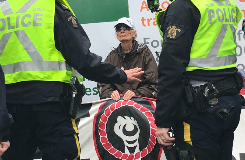  Order of Canada recipient Jean Swanson just before she was arrested at the Burnaby Mountain tank farm owned by Kinder Morgan.