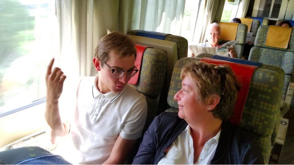  Jacob Wallace chats with passenger Sharon Chapman. Photo Summer By Rail