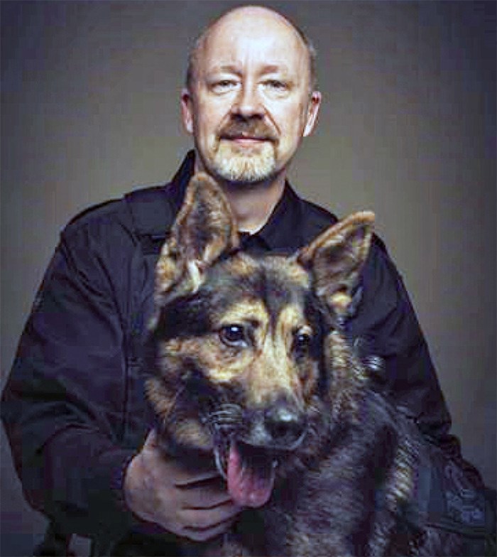  Retired Vancouver Police Department service dog Bosco poses with his handler, Const. Bruce Rhode. In 2016, the pair subdued a serial robber who will be sentenced in August.