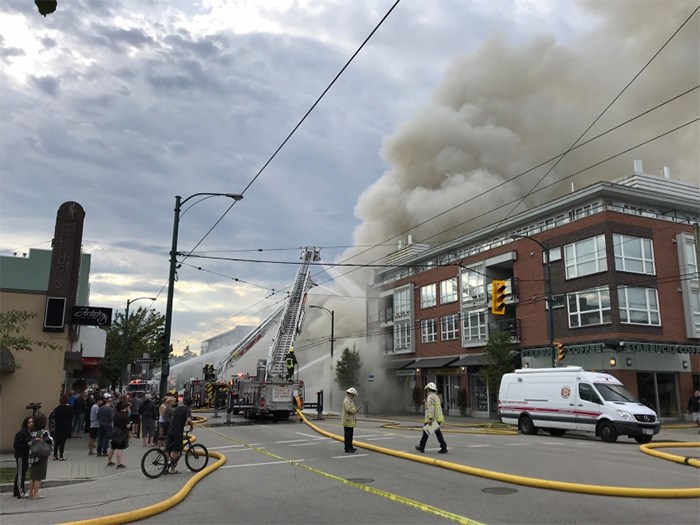  Adrian Cunningham took this photo as fire crews battled the fire that broke out this morning on West Fourth Avenue. Photo Adrian Cunningham