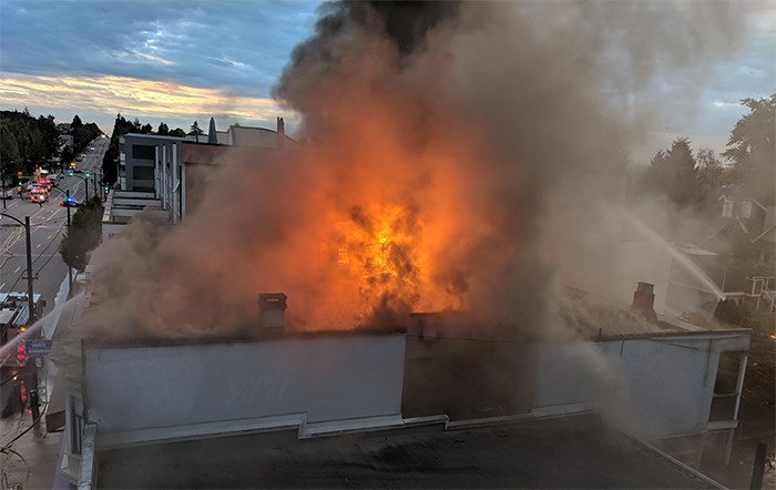  Residents captured dramatic moments from a fire that broke out at a building on West Fourth Avenue - Chris Comeau