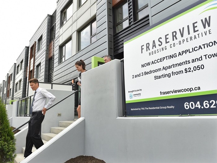  Mayor Gregor Robertson helped mark the opening of the first phase of the Fraserview Housing Co-operative on East Kent Avenue in River District on July 9. Rents for the 90 units in this phase will be between $2,050 and $2,750. Some Courier readers were shocked by those figures. Photo Dan Toulgoet