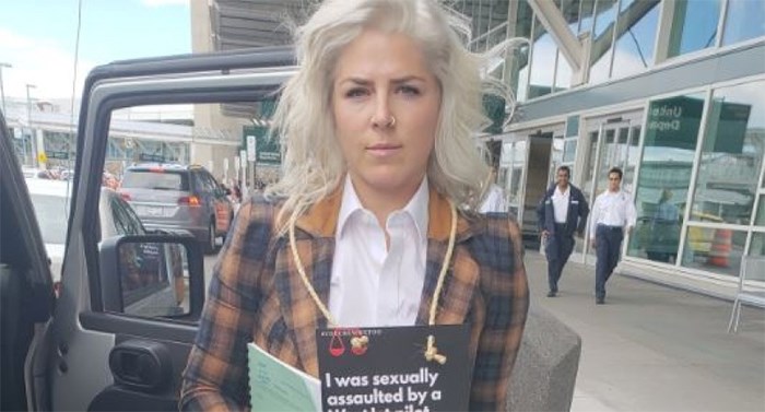  Mandalena Lewis, a former WestJet flight attendant, outside Vancouver International Airport on July 6. Photo: Mandalena Lewis/Twitter