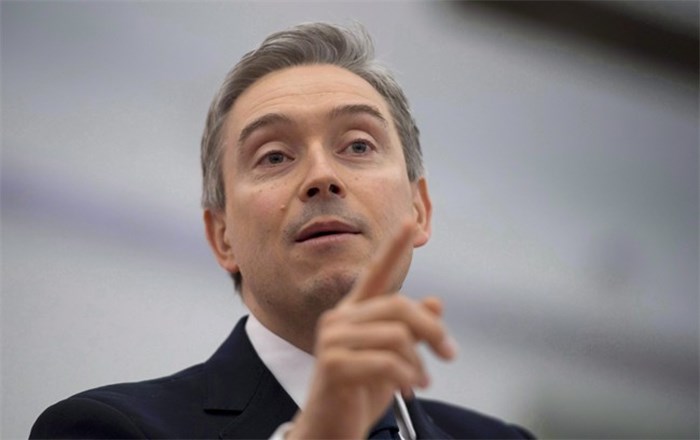  Minister of International Trade Francois-Philippe Champagne addresses a gathering at the Globe Forum in Vancouver, Wednesday, March 14, 2018. The federal Liberal government embarked on an exhaustive creative process and spent $24,000 to hire a consultant to help re-brand its new investment promotion body to grab the attention of foreign investors. In the end, Ottawa dropped one word off the end of the old name, 