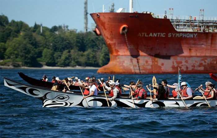  Members of Coast Salish Nations lead a flotilla from North Vancouver to Trans Mountain's Westridge marine terminal in Burnaby to perform a ceremony on the water.