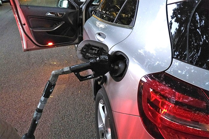  A Filld gas delivery truck gassing up a Car2Go carshare vehicle off Cambie Street in Vancouver. Photo Bob Kronbauer