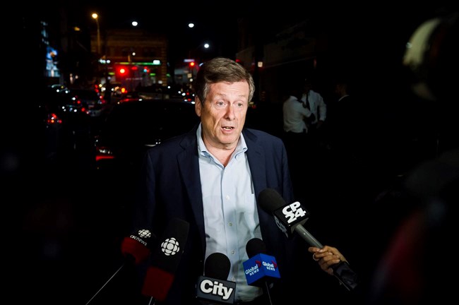  Toronto Mayor John Tory speaks to press following a mass casualty event in Toronto on Monday, July 23, 2018. The new federal minister responsible for tackling gun violence says he has been in touch with Toronto's mayor and police chief to discuss Sunday's deadly shooting in the city and how Ottawa can support efforts to stop a growing wave of incidents rattling Torontonians.THE CANADIAN PRESS/Christopher Katsarov