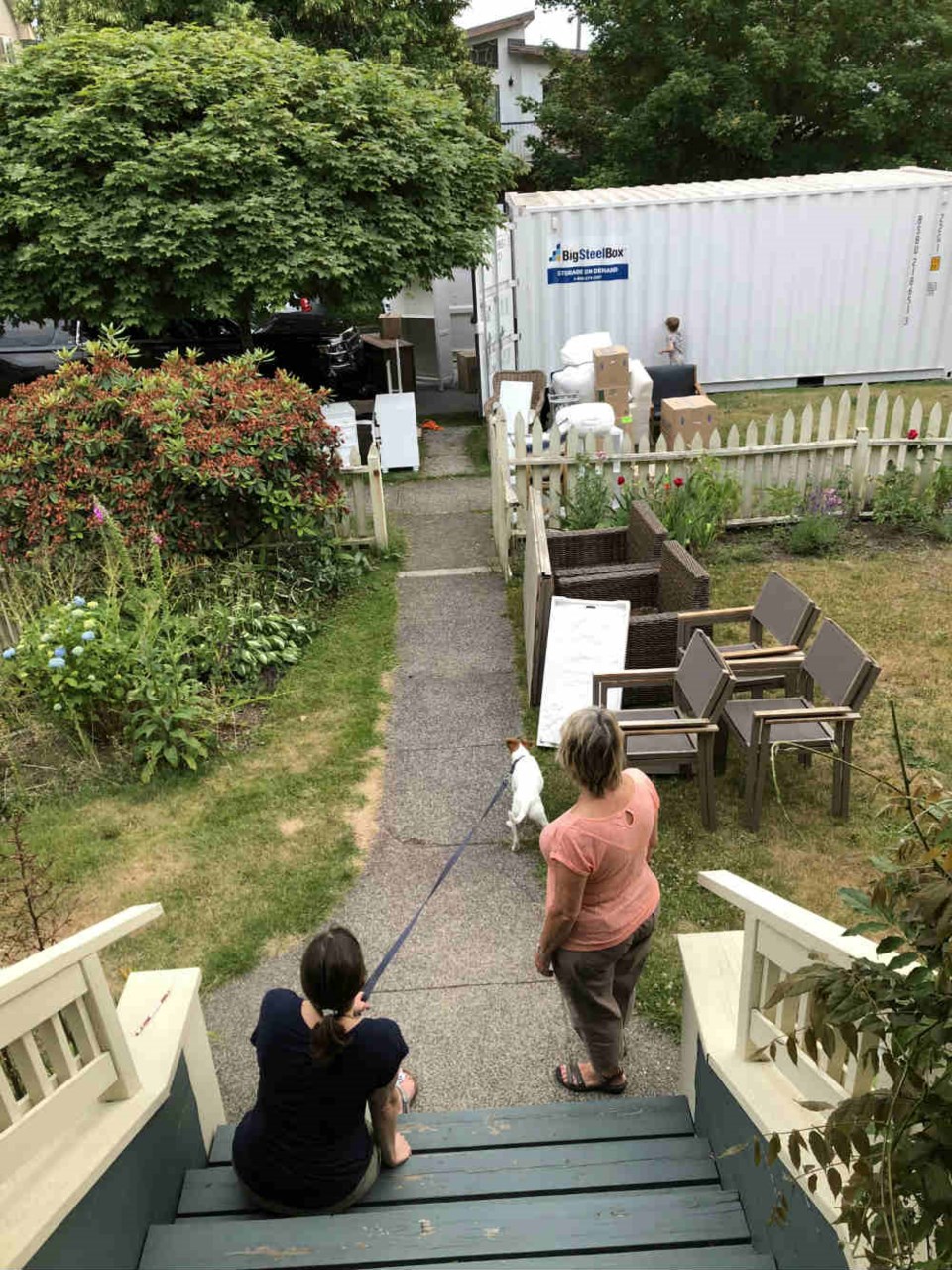  Loading their belongings into a BigSteelBox. Photo contributed.