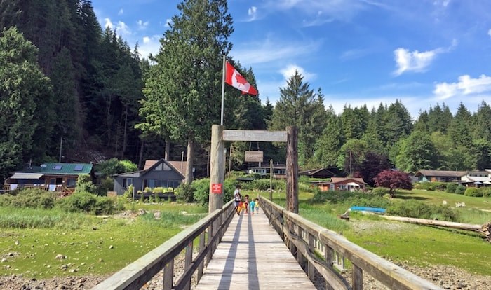  Just a 10-minute boat ride from Deep Cove, the private 22-lot development of Brighton Beach has been charming residents and invited guests since the 1940s. Photo Grant Lawrence