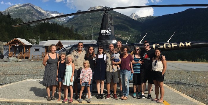  PHOTO BY MEGAN LALONDE - EPIC RETURN Heli pilots Ruben Dias and Mischa Gelb were greeted by family, friends and fans when they returned home from a 97-day trip around the world on Sunday, August 5.