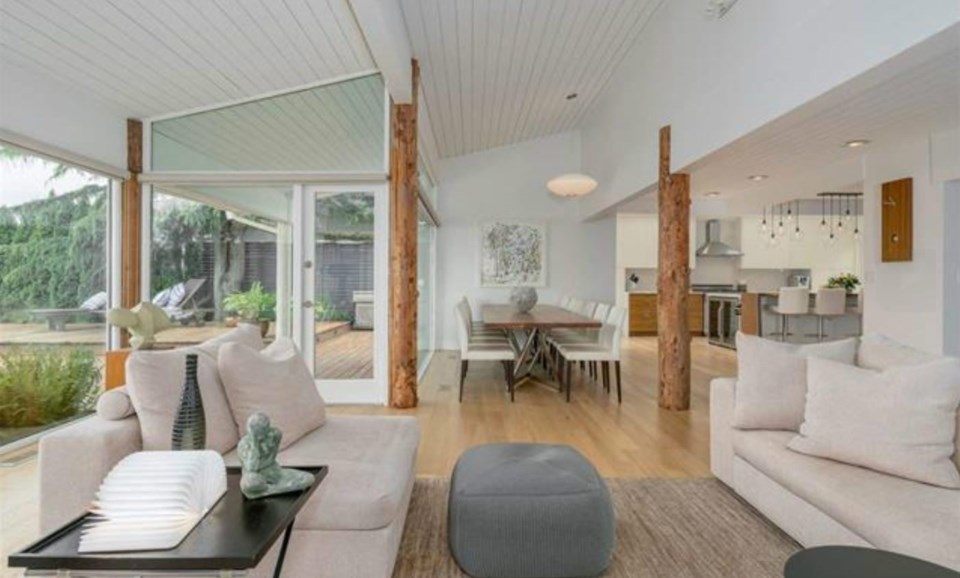 The great room of this home opens right up to the deck for indoor-outdoor living. Listing agent: Philip DuMoulin