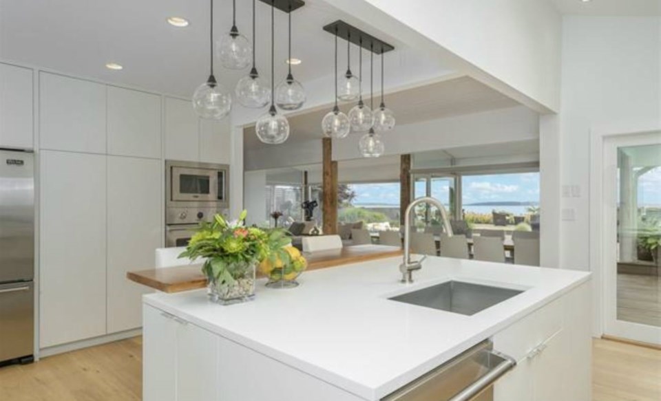  The open concept nature of this great room means that you get ocean views even when you're in the kitchen. Listing agent: Philip DuMoulin