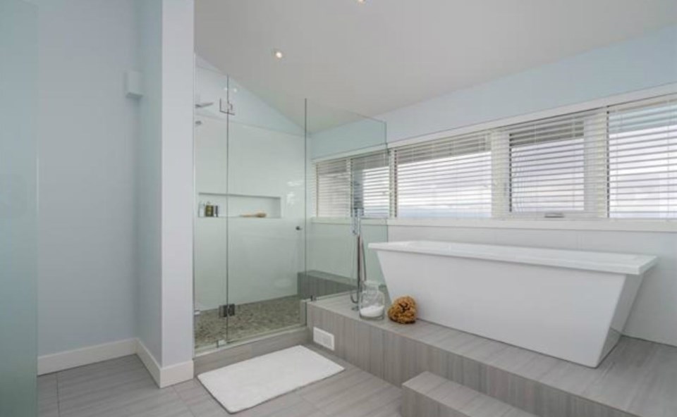  Even the shower and tub in the master ensuite get views of that blue horizon. Listing agent: Philip DuMoulin