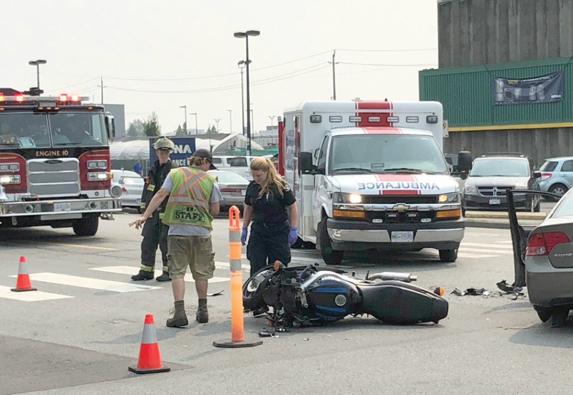  First Responders in North Vancouver deal with a crash on West 1st Street Monday. photo Brent Richter, North Shore News