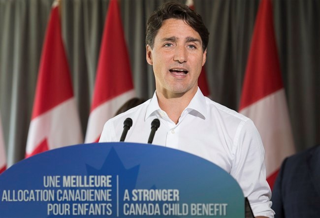  Prime Minister Justin Trudeau answers reporters questions during an event in Saint-Eustache, Que., Thursday, August 16, 2018. THE CANADIAN PRESS/Graham Hughes