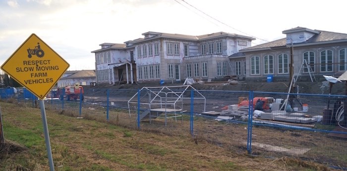  This mega mansion (22,000-plus square feet) at No. 4 Road and Steveston Highway galvanized a movement to reform the ALC Act. File photo