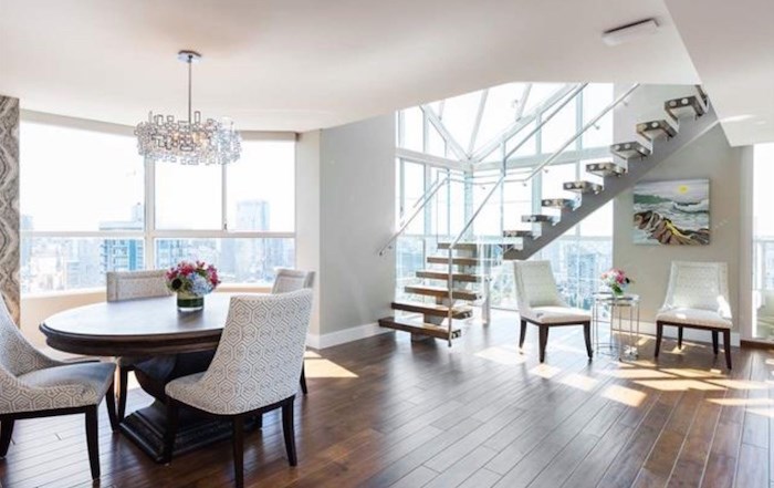  There are two staircases connecting the two levels of this penthouse, this one being a super-cool floating stair. Listing agents: John J Zhou, Fan Yang