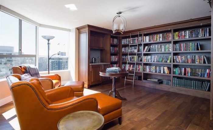 The custom, wood-panelled library is on the upper bedroom floor. Listing agents: John J Zhou, Fan Yang