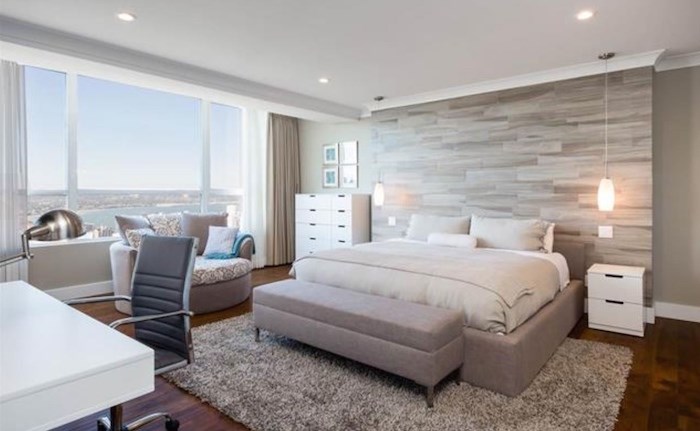  The master bedroom has serene decor and a sublime view. Listing agents: John J Zhou, Fan Yang