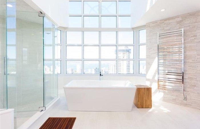  We never show two pictures of the same bathroom, but... Just look at the ocean views from that tub. Listing agents: John J Zhou, Fan Yang