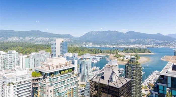  The northern aspect has unbeatable views of the North Shore mountains. Listing agents: John J Zhou, Fan Yang