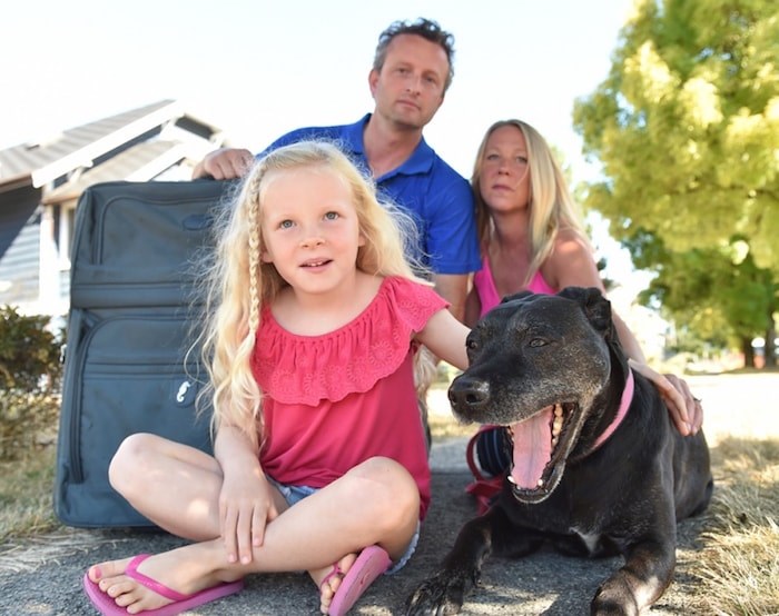  Bryan Stewart with wife Andrea Robbie, daughter Sadie, 6, and their dog Maggie, 12. “I have a good job here. But at some point you say, good job or not, what’s left over is not enough,