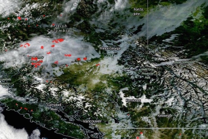  A NASA Worldview image from space shows the smoke from wildfires spreading across B.C. Photo NASA