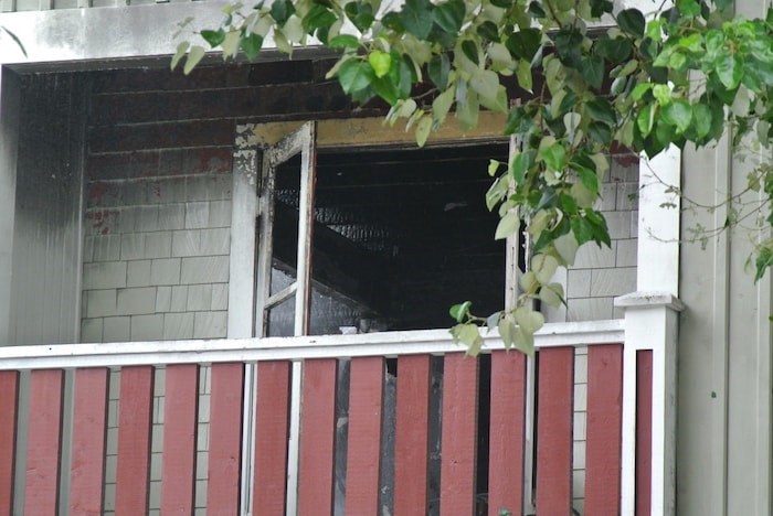  The upper floor was gutted by the flames. - Martha Perkins