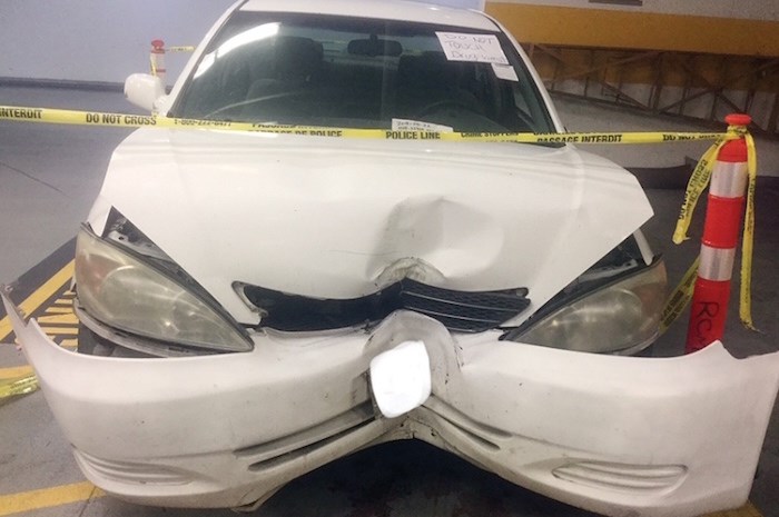  Police are conducting a mechanical inspection on this vehicle after a driver hopped the curb and hit a pedestrian on a Central Lonsdale sidewalk. photo supplied North Vancouver RCMP