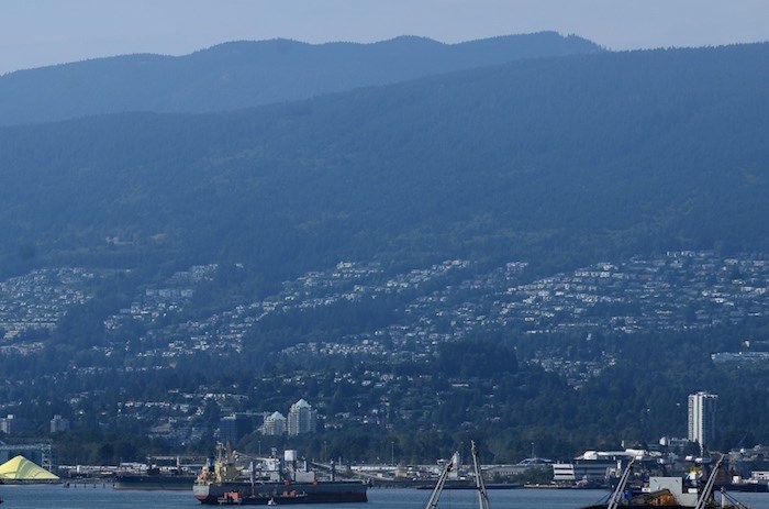  This photo taken Friday afternoon shows the North Shore mountains, which had been obscured from view anywhere in Vancouver for at least a week. (Photo by Jennifer Gauthier)