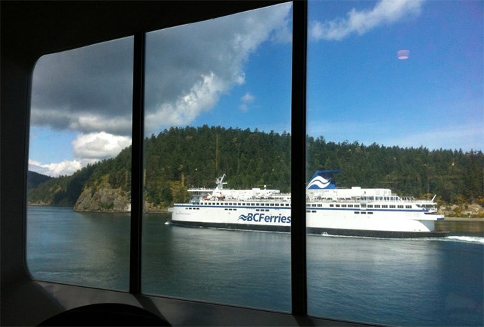  Spirit of British Columbia ferry in Active Pass, as seen from a buffet room window on sister-ship Spirit of Vancouver Island.