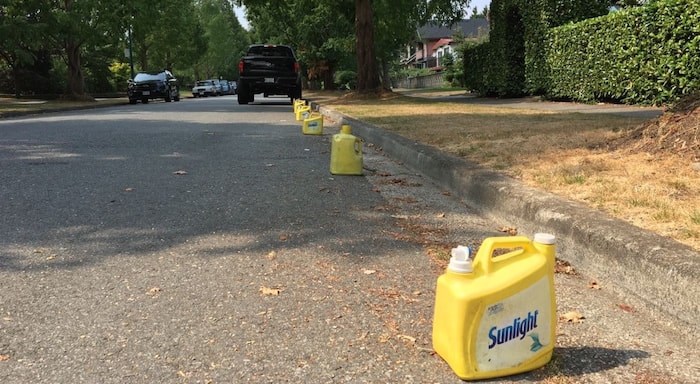  Reserving a parking space in front of your home with buckets, cones, plywood, homemade signs or other physical objects is looked down upon by many residents of Hastings-Sunrise. Photo Grant Lawrence