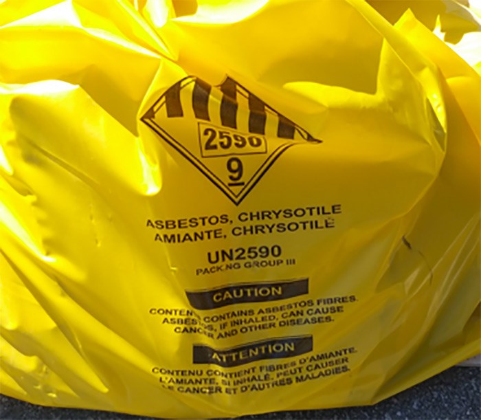  A closeup of the bags of asbestos.  Photo @mondeeredman