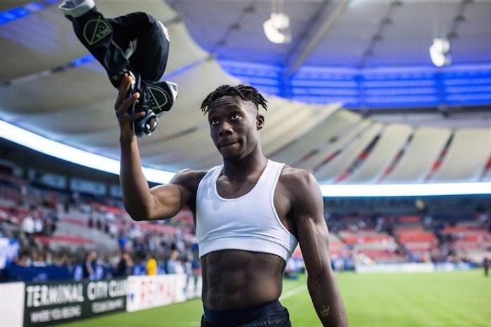  Vancouver Whitecaps' Alphonso Davies walks towards spectators to give his jersey to a fan after defeating the San Jose Earthquakes 2-1 during an MLS soccer match in Vancouver, on Saturday September 1, 2018. Canadian teen soccer star Alphonso Davies is among the athletes featured in a new Nike campaign featuring Colin Kaepernick that's drawing attention worldwide. THE CANADIAN PRESS/Darryl Dyck