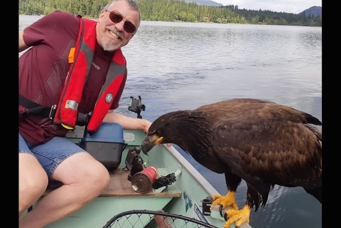  Derril McKenzie has the photos to prove that his story about an eagle that landed on his boat was not a tall fisherman's tale.