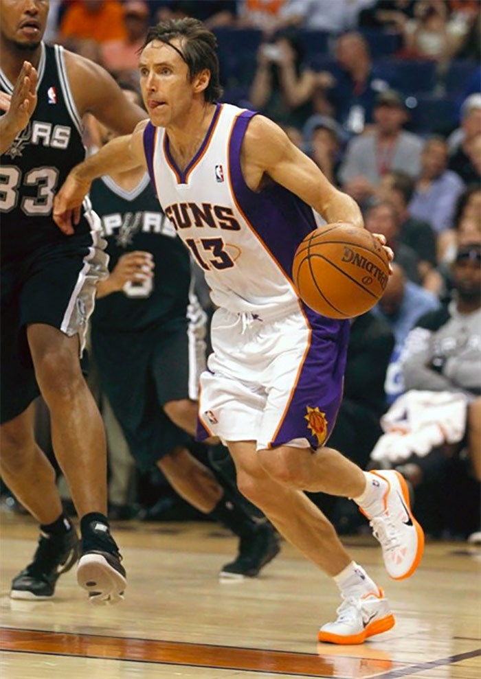  In this April 25, 2012, file photo, Phoenix Suns' Steve Nash (13) competes against the San Antonio Spurs during the second half of an NBA basketball game in Phoenix. When Nash is inducted into the Naismith Hall of Fame on Friday, his high school coach will be watching from Victoria, B.C., and beaming with pride. Ian Hyde-Lay says he feels lucky to have played a part in the all-star's career. THE CANADIAN PRESS/AP/Matt York, File)