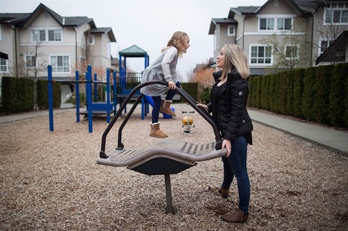  Rahel Staeheli plays with her daughter Milani Staeheli-Hildebrand, 5, at a playground near their home in Surrey, B.C., on April 11, 2018. Rahel Staeheli had her daughter on three wait lists for a spot in French immersion but Milani didn't get into any of them when she started school last week. Staeheli is among parents across the country who say a lack of French-immersion teachers is depriving their kids of a bilingual education. THE CANADIAN PRESS/Darryl Dyck