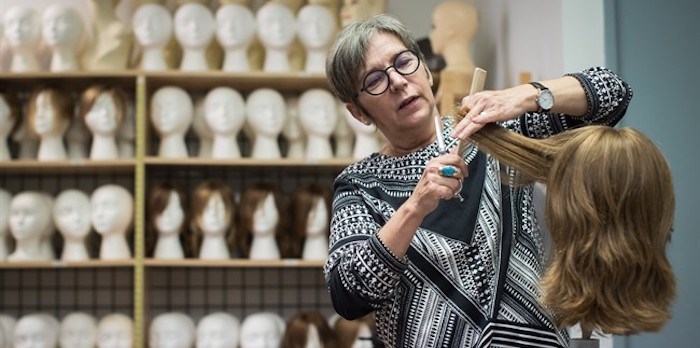  Frances Rae, manager of Eva and Company Wigs, works at the store where a collection of wigs worth more than $350,000 that were intended for cancer patients at B.C. Childrens' Hospital were stolen, in Vancouver, on Wednesday September 12, 2018. Police say at least 150 wigs worth approximately $2,500 each were taken on Friday morning. THE CANADIAN PRESS/Darryl Dyck
