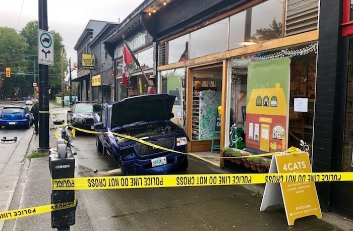  Vancouver police were pursuing the blue truck's driver, who had crossed the border without stopping, when the driver was involved in an accident at West 10th Ave. and Alma Street. Photograph By Craig Roberts