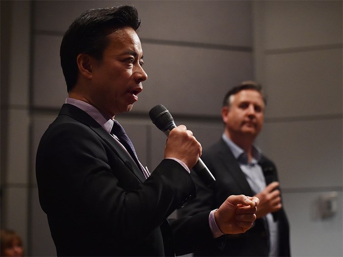  Independent candidate Kennedy Stewart looks on as the NPA's Ken Sim answers a question. Photo Dan Toulgoet