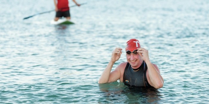  Chad Bentley emerges from the water during one of the swims in the Epic-5, an adventure race that involved completing five full Ironman Triathlons in five days on five different Hawaiian islands. (Photo: Colin Cross)