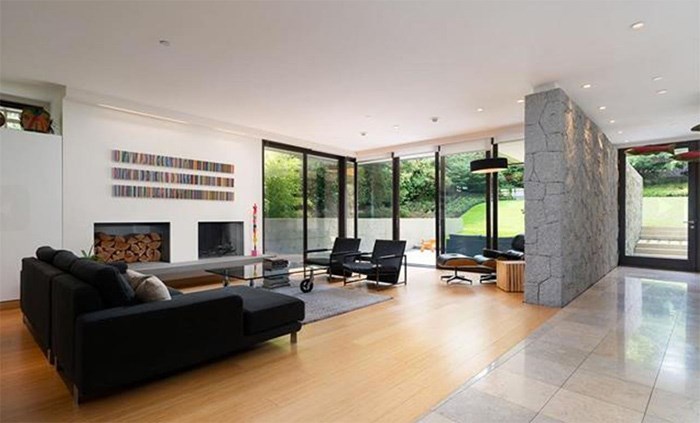  The large, open-concept living room leads out to the sloping back garden. Listing agent: Faith Wilson