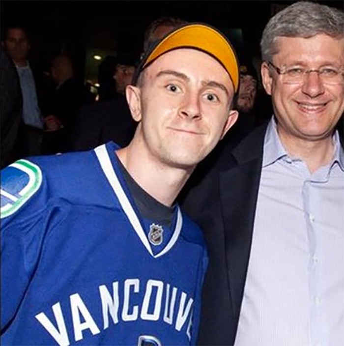  Justin Caudwell with former Prime Minister Stephen Harper. Photo Twitter.